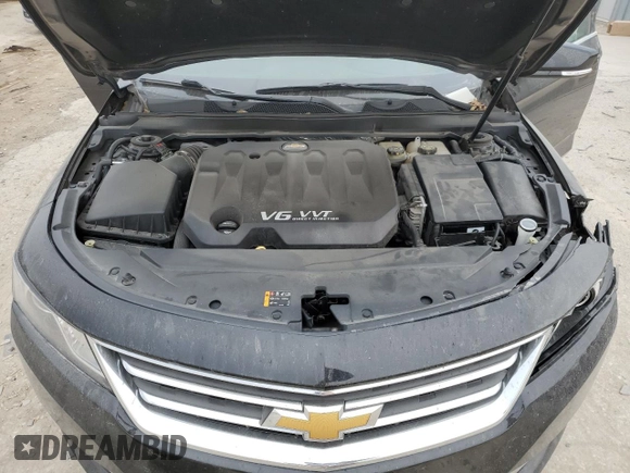 2014 Chevrolet Impala LT with VIN 1G1125S32EU165740, listed as a Copart auction lot 84630694 with 128,215 mi miles and Salvage Title. Bid and sale history available at DreamBid. Image 11.