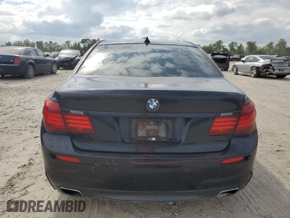 2015 BMW 7 Series 750i with VIN WBAYA8C59FG197642, listed as a Copart auction lot 70282884 with 130,853 mi miles and Salvage title. Bid and sale history available at DreamBid. Image 6.