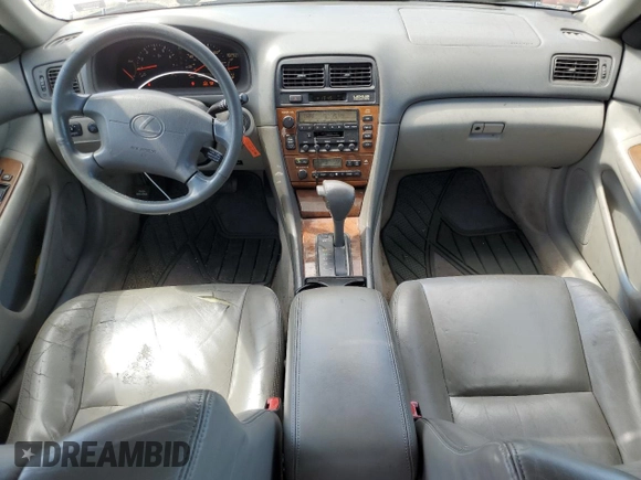 2000 Lexus ES 300 with VIN JT8BF28G0Y0255147, listed as a Copart auction lot 61464825 with 144,601 mi miles and Clean title. Bid and sale history available at DreamBid. Image 8.