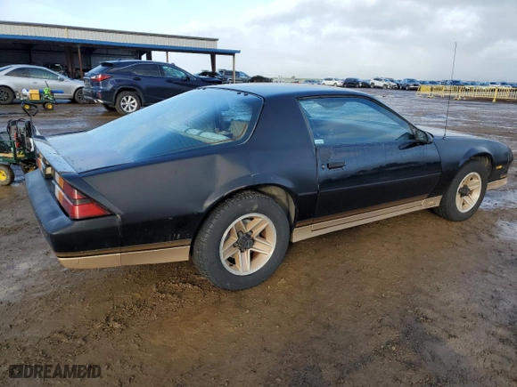 1984 Chevrolet Camaro Z28 Sport with VIN 1G1AP87G7EL175104, listed as a Copart auction lot 86895534 with 27,874 mi miles and Salvage Title. Bid and sale history available at carsss.com. Image 3.