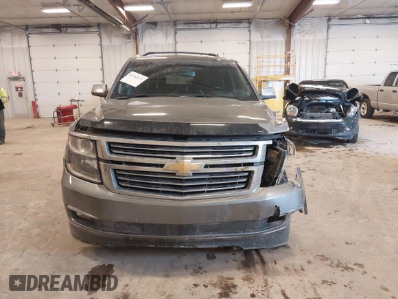 2019 Chevrolet Suburban Premier with VIN 1GNSKJKC1KR291629, listed as a IAAI auction lot 41565675 with 129,672 mi miles and . Bid and sale history available at DreamBid. Image 12.