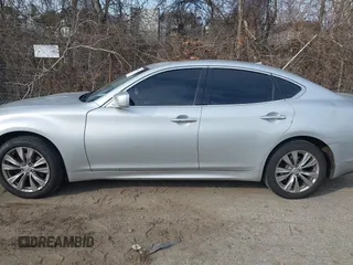 2013 Infiniti M z VIN JN1BY1AR0DM600278, wystawiony jako IAAI lot #41303485 z przebiegiem 298 943 mil mil oraz . Historia ofert i sprzedaży dostępna na DreamBid. Obrazek 14.