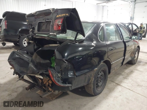 1998 Toyota Avalon XL with VIN 4T1BF18B5WU229340, listed as a IAAI auction lot 41957632 with 212,657 mi miles and . Bid and sale history available at DreamBid. Image 4.