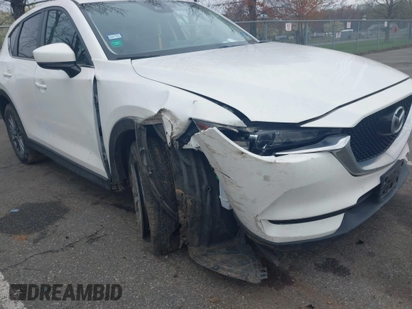 2017 Mazda CX-5 Touring with VIN JM3KFACL5H0189296, listed as a IAAI auction lot 42042328 with 60,208 mi miles and . Bid and sale history available at carsss.com. Image 6.