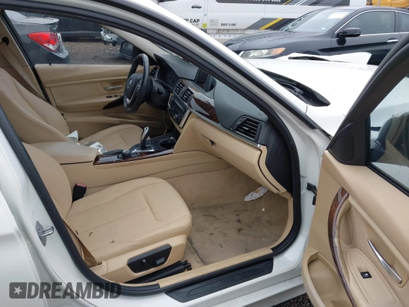 2014 BMW 3 Series 328i xDrive with VIN WBA3B5G50ENS06304, listed as a IAAI auction lot 41402704 with 139,943 mi miles. Bid and sale history available at carsss.com. Image 5.