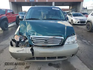 2002 Kia Sedona LX with VIN KNDUP131426217512, listed as a Copart auction lot 80928774 with 163,176 mi miles and Salvage Title. Bid and sale history available at carsss.com. Image 5.