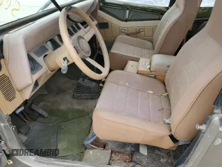 1988 Jeep Wrangler z VIN 2BCCV81M2JB518868, wystawiony jako Copart lot #57649935 z przebiegiem 192 317 mil mil oraz Czysty tytuł • Clean title. Historia ofert i sprzedaży dostępna na DreamBid. Obrazek 7.