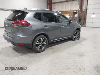 2017 Nissan Rogue S with VIN JN8AT2MV6HW275480, listed as a IAAI auction lot 41731679 with 143,932 mi miles and . Bid and sale history available at DreamBid. Image 4.