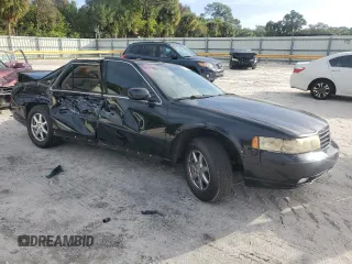 2002 Cadillac Seville Luxury SLS z VIN 1G6KS54Y42U220496, wystawiony jako Copart lot #80883764 z przebiegiem 221 629 mil mil oraz Czysty tytuł • Clean title. Historia ofert i sprzedaży dostępna na DreamBid. Obrazek 4.