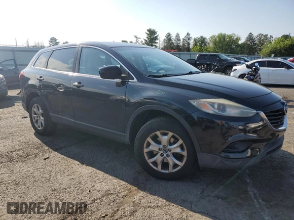 2014 Mazda CX-9 Sport with VIN JM3TB2BV6E0431971, listed as a Copart auction lot 63778635 with 136,287 mi miles and Salvage title. Bid and sale history available at DreamBid. Image 4.