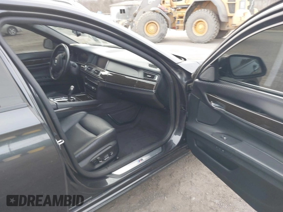 2015 BMW 7 Series 750i xDrive with VIN WBAYB6C56FG299238, listed as a IAAI auction lot 41441393 with 62,396 mi miles. Bid and sale history available at carsss.com. Image 5.
