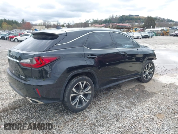 2019 Lexus RX with VIN 2T2BZMCA6KC176890, listed as a IAAI auction lot 41888637 with 51,529 mi miles. Bid and sale history available at carsss.com. Image 4.