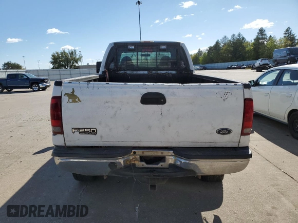 2000 Ford Super Duty F-250 XL with VIN 1FTNW21S9YEA11478, listed as a Copart auction lot 75907414 with 195,203 mi miles and Clean Title. Bid and sale history available at carsss.com. Image 6.