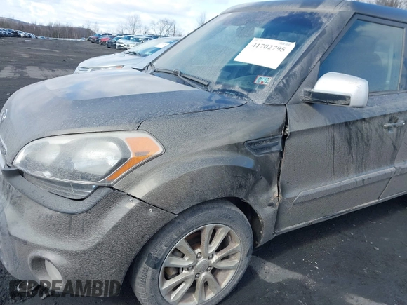 2012 Kia Soul + with VIN KNDJT2A60C7392564, listed as a IAAI auction lot 41702795 with 147,282 mi miles. Bid and sale history available at carsss.com. Image 6.