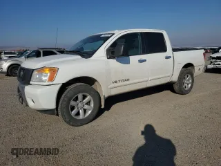 2015 Nissan Titan SV with VIN 1N6AA0EC1FN507132, listed as a Copart auction lot 74401954 with 169,236 mi miles and Salvage title. Bid and sale history available at DreamBid. Image 1.