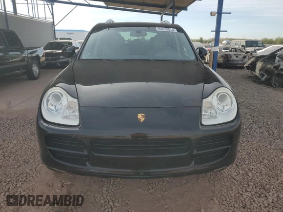 2005 Porsche Cayenne z VIN WP1AA29P65LA20822, wystawiony jako Copart lot #84620014 z przebiegiem 99 755 mil mil oraz Czysty tytuł • Clean title. Historia ofert i sprzedaży dostępna na DreamBid. Obrazek 5.