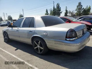 2004 Ford Crown Victoria LX с VIN 2FAFP74W44X184918, выставлен на аукционе Copart как лот 73346744 с пробегом 157 925 миль миль и Списание • Salvage title. История ставок и продаж доступна на DreamBid. Изображение 2.