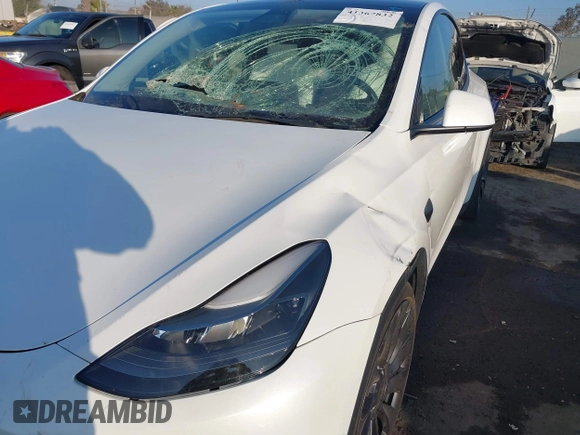 2021 Tesla Model Y Performance with VIN 5YJYGDEF2MF258711, listed as a IAAI auction lot 41367832 with 47,662 mi miles and . Bid and sale history available at DreamBid. Image 6.