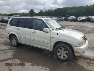2002 Suzuki XL7 Standard z VIN JS3TY92V024106089, wystawiony jako Copart lot #58418685 z przebiegiem 232 254 mil mil oraz Szkoda całkowita • Salvage title. Historia ofert i sprzedaży dostępna na DreamBid. Obrazek 4.