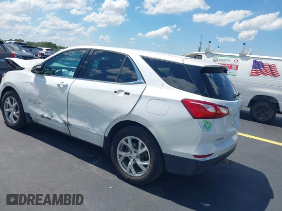 2020 Chevrolet Equinox LT z VIN 3GNAXKEV0LS650936, wystawiony jako IAAI lot #42263480 z przebiegiem 51 723 mil mil oraz . Historia ofert i sprzedaży dostępna na DreamBid. Obrazek 3.