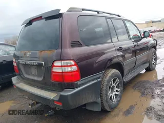 2004 Toyota Land Cruiser with VIN JTEHT05J242066695, listed as a IAAI auction lot 41725358 with 226,895 mi miles. Bid and sale history available at carsss.com. Image 4.