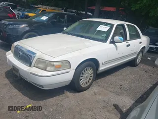 2008 Mercury Grand Marquis LS with VIN 2MEFM75VX8X600015, listed as a IAAI auction lot 42142359 with 310,481 mi miles and . Bid and sale history available at DreamBid. Image 2.