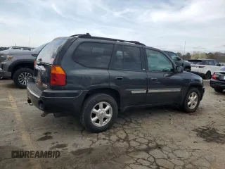 2003 GMC Envoy SLT z VIN 1GKDS13S332326838, wystawiony jako Copart lot #48888545 z przebiegiem 197 969 mil mil oraz Czysty tytuł • Clean title. Historia ofert i sprzedaży dostępna na DreamBid. Obrazek 3.