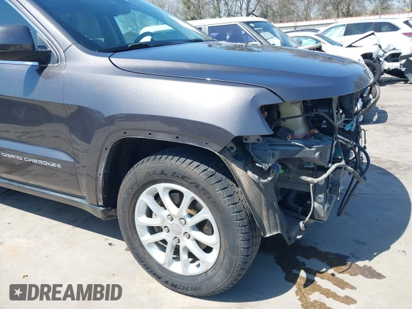 2015 Jeep Grand Cherokee Altitude with VIN 1C4RJEAG0FC952260, listed as a IAAI auction lot 41738692 with 124,197 mi miles. Bid and sale history available at carsss.com. Image 18.