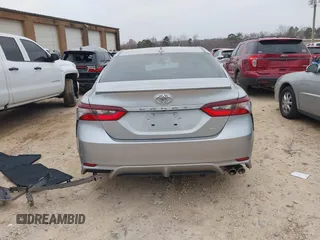 2024 Toyota Camry SE z VIN 4T1G11AK2RU211798, wystawiony jako IAAI lot #41613966 z przebiegiem 32 689 mil mil oraz . Historia ofert i sprzedaży dostępna na DreamBid. Obrazek 17.