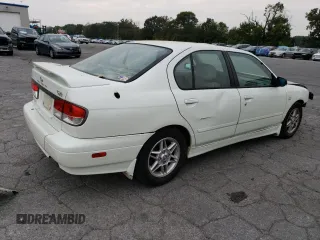 2002 Infiniti G20 Luxury z VIN JNKCP11AX2T500141, wystawiony jako Copart lot #70648434 z przebiegiem 196 559 mil mil oraz Szkody całkowita. Historia ofert i sprzedaży dostępna na DreamBid. Obrazek 3.