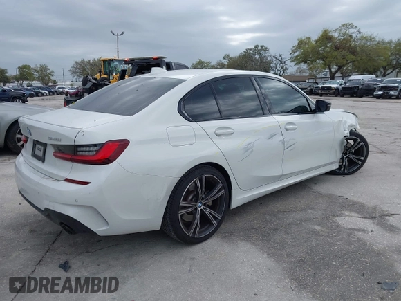2022 BMW 3 Series 330i with VIN 3MW5R1J06N8C46898, listed as a IAAI auction lot 41715618 with 44,533 mi miles. Bid and sale history available at carsss.com. Image 4.
