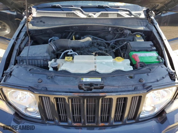 2012 Jeep Liberty Sport with VIN 1C4PJLAKXCW126722, listed as a Copart auction lot 49851825 with 100,419 mi miles and Salvage Title. Bid and sale history available at carsss.com. Image 12.