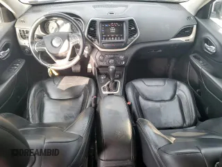2016 Jeep Cherokee Limited with VIN 1C4PJMDB3GW261581, listed as a Copart auction lot 52699135 with 162,510 mi miles and Salvage Title. Bid and sale history available at DreamBid. Image 8.