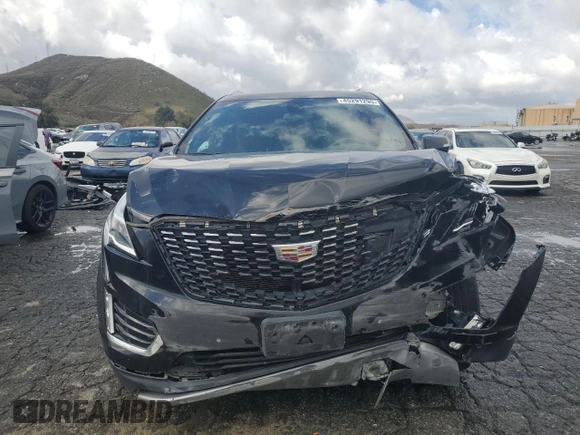 2023 Cadillac XT5 AWD Premium Luxury z VIN 1GYKNDRS6PZ144478, wystawiony jako Copart lot #45291295 z przebiegiem 45 910 mil mil oraz Nie do naprawy • Non repairable. Historia ofert i sprzedaży dostępna na DreamBid. Obrazek 5.