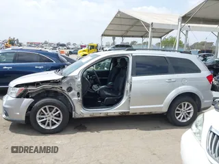 2013 Dodge Journey SXT with VIN 3C4PDCBG9DT506384, listed as a IAAI auction lot 42119685 with 143,769 mi miles. Bid and sale history available at carsss.com. Image 15.