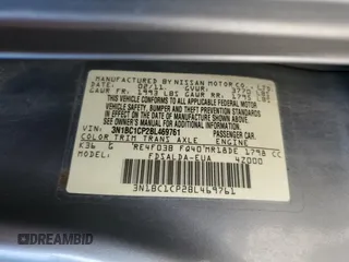 2011 Nissan Versa S z VIN 3N1BC1CP2BL469761, wystawiony jako Copart lot #57906935 z przebiegiem 178 416 mil mil oraz Szkoda całkowita • Salvage title. Historia ofert i sprzedaży dostępna na DreamBid. Obrazek 13.