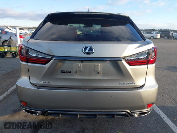 2021 Lexus RX with VIN 2T2SZMDA6MC307463, listed as a IAAI auction lot 40955402 with 7,308 mi miles. Bid and sale history available at carsss.com. Image 16.