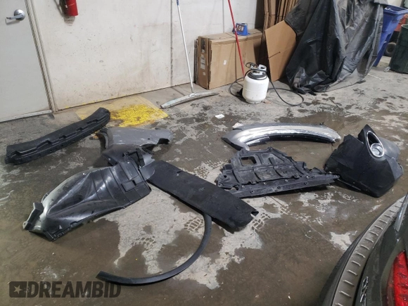2014 Infiniti QX70 z VIN JN8CS1MW5EM412429, wystawiony jako Copart lot #82933934 z przebiegiem Nie podano mil oraz Szkoda całkowita • Salvage title. Historia ofert i sprzedaży dostępna na DreamBid. Obrazek 12.
