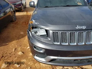 2015 Jeep Grand Cherokee Summit with VIN 1C4RJFJG8FC679185, listed as a IAAI auction lot 41653531 with 158,186 mi miles and . Bid and sale history available at DreamBid. Image 18.