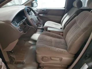 2001 Toyota Sienna LE with VIN 4T3ZF13C21U364516, listed as a Copart auction lot 79759924 with 100,185 mi miles and Salvage Title. Bid and sale history available at carsss.com. Image 7.