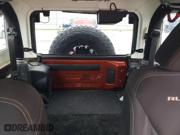 2014 Jeep Wrangler Rubicon with VIN 1C4BJWCG2EL303420, listed as a Copart auction lot 63550985 with 87,175 mi miles and Salvage title. Bid and sale history available at DreamBid. Image 10.