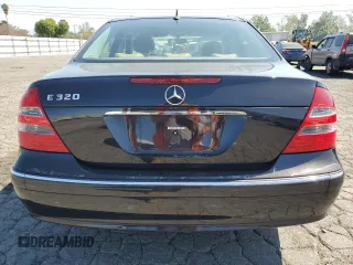 2005 Mercedes-Benz E 320 with VIN WDBUF65J55A675993, listed as a Copart auction lot 52446015 with 64,459 mi miles and Salvage Title. Bid and sale history available at DreamBid. Image 6.