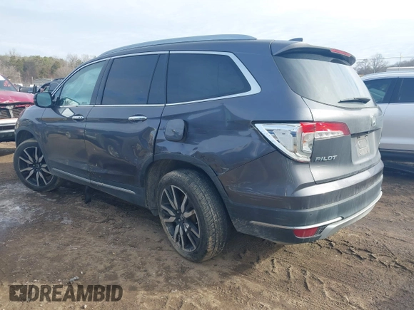 2019 Honda Pilot Touring 7-Passenger with VIN 5FNYF6H67KB018769, listed as a IAAI auction lot 41310452 with 92,499 mi miles. Bid and sale history available at carsss.com. Image 3.