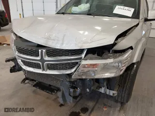 2013 Dodge Journey SXT with VIN 3C4PDCBG4DT720912, listed as a IAAI auction lot 39184206 with 120,147 mi miles. Bid and sale history available at carsss.com. Image 6.