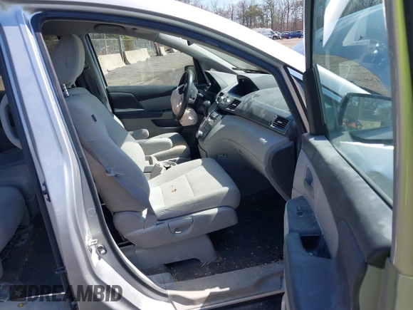 2013 Honda Odyssey EX z VIN 5FNRL5H43DB042964, wystawiony jako IAAI lot #41877997 z przebiegiem 130 282 mil mil oraz . Historia ofert i sprzedaży dostępna na DreamBid. Obrazek 5.
