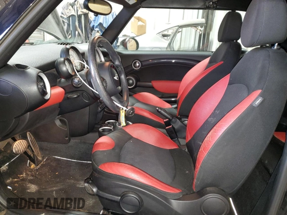 2012 MINI Convertible S z VIN WMWZP3C52CT250657, wystawiony jako Copart lot #83876114 z przebiegiem 18 511 mil mil oraz Szkoda całkowita • Salvage title. Historia ofert i sprzedaży dostępna na DreamBid. Obrazek 7.