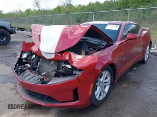 2020 Chevrolet Camaro 1LT with VIN 1G1FB1RX5L0106371, listed as a IAAI auction lot 41935290 with 77,286 mi miles and . Bid and sale history available at DreamBid. Image 2.
