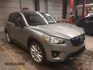 2014 Mazda CX-5 Grand Touring with VIN JM3KE4DY5E0305882, listed as a IAAI auction lot 41879532 with 173,443 mi miles. Bid and sale history available at carsss.com. Image 1.