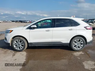 2020 Ford Edge Titanium z VIN 2FMPK3K98LBA42159, wystawiony jako IAAI lot #42358229 z przebiegiem 88 512 mil mil oraz . Historia ofert i sprzedaży dostępna na DreamBid. Obrazek 14.