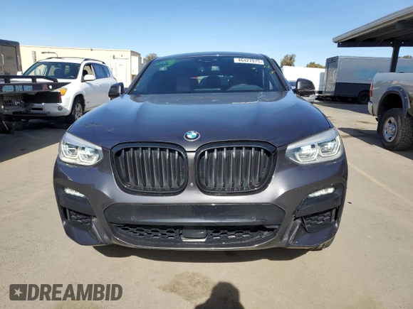 2020 BMW X4 xDrive30i with VIN 5UX2V1C04L9C32419, listed as a Copart auction lot 46427975 with 58,623 mi miles and Salvage Title. Bid and sale history available at carsss.com. Image 5.